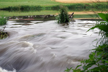 Naklejka premium At a small stream in the Bavarian Germany, there are wonderful landscape to admire 