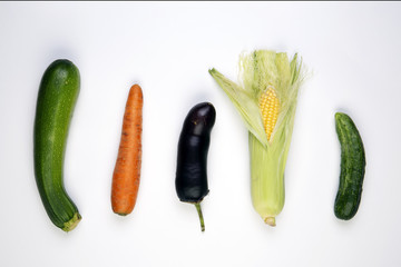 vegetables phallic on white background, penis, sex concept