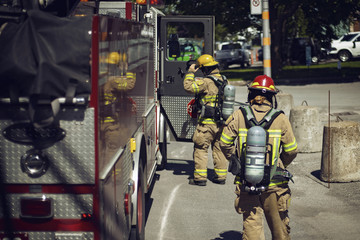 Firefighter with protection clothes working