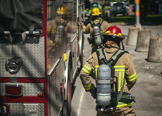 Firefighter with protection clothes working