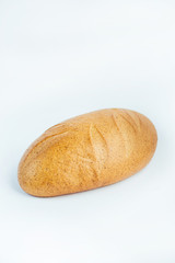 Large loaf of bread isolated on white background