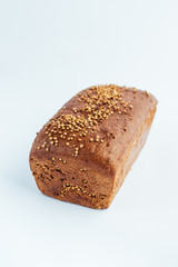 Fresh whole wheat bread isolated on white background