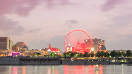 Fototapeta na wymiar Long exposure shot - Night City View on the old Port of Montreal, Quebec, Canada