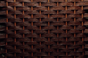 Naklejka premium brown basket weaving wood background