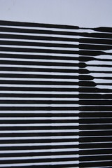 Black and white abstraction of white stripes and black stripes super background, art