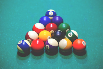 billiard balls on the table, retro toned