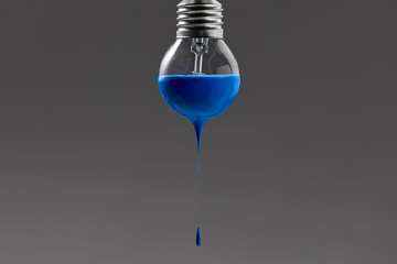 Bulb with blue paint on it