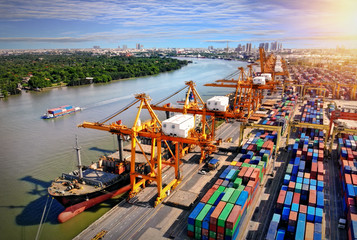 Logistics and transportation of Container Cargo ship and Cargo plane with working crane bridge in...