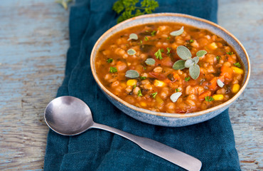 Hearty Bean Mix Soup in Blue Bowl