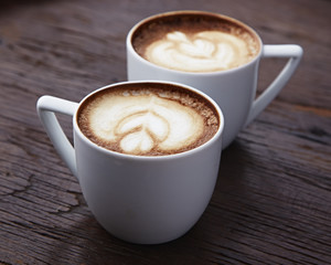 Two white cups of coffee
