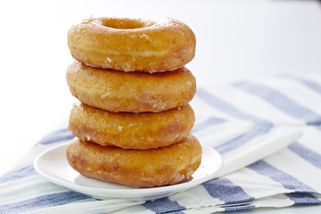 Donut isolated on a white plate