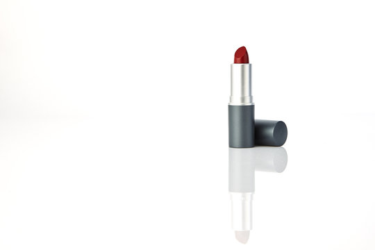red lipstick on white