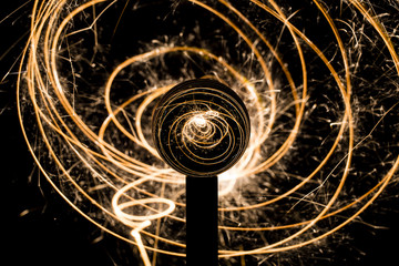 magic crystal ball with sparkles sparklers electricity spinning in circles