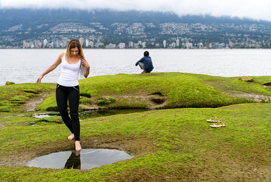 People exploring the intertidal zone of Vancouver, British Columbia