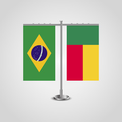 Table stand with flags of Brazil and Benin.Two flag. Flag pole. Symbolizing the cooperation between the two countries. Table flags