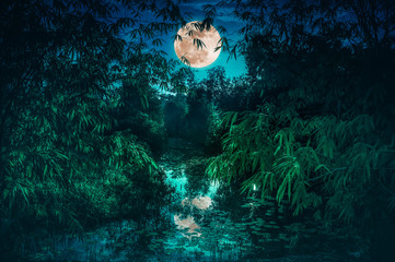 Tranquil river with full moon and bamboo trees. Serenity nature background.