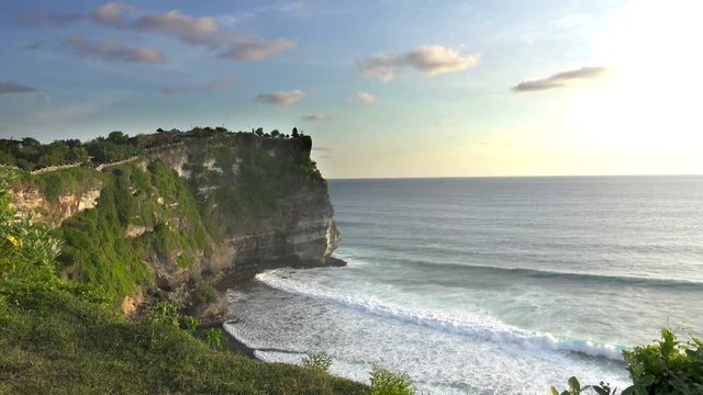 Pura Luhur Uluwatu. Bali Indonesia, the Panoramic view in time sunset