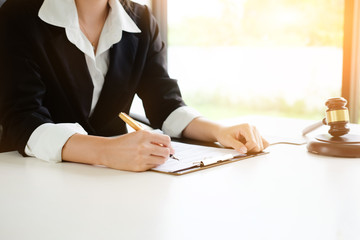 Lawyer working on a documents. Legal law, advice and justice concept.