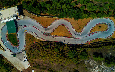 Obraz premium Aerial drone view of a kart racing in the forest, view from above, Turkey