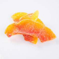 dried papaya slices on background