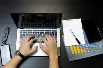 Business man working on a laptop