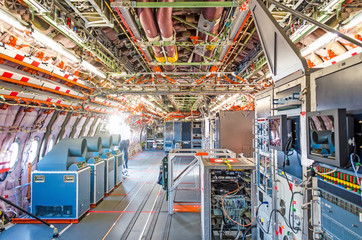 Inside the aircraft under test the equipment is salon equipment mechanisms. © aapsky