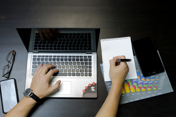Business man working on a laptop