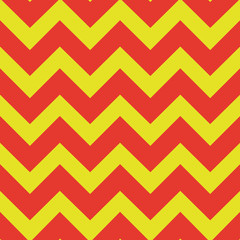 Chevron pattern, zigzag lines. Seamless background. Bright orange and yellow. For printing on fabric, paper, wrapper. 
