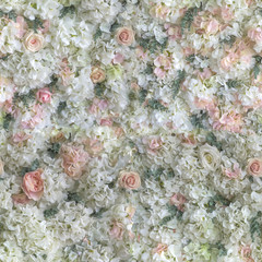 Wedding background of fresh flowers of white and pink roses