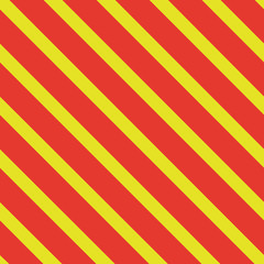 Pattern with vertical lines. Seamless background. Bright orange and yellow. For printing on fabric, paper, wrapper.