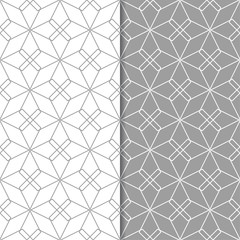 Gray and white geometric ornaments. Set of seamless patterns