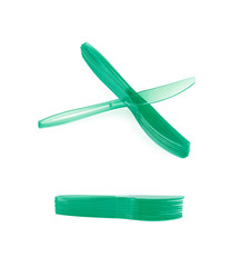 Pile of disposable knives isolated