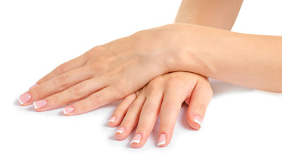 Naklejka premium Female hand french manicure on white background isolation