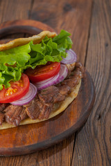 background,barbecue,beef,bread,cabbage,chicken,closeup,dinner,donner,döner,fast,food,greek,green,grilled,gyro,hamburger,health,healthy food,kebab,kebap,lettuce,lunch,meal,meat,onion,orange,pita,roast,