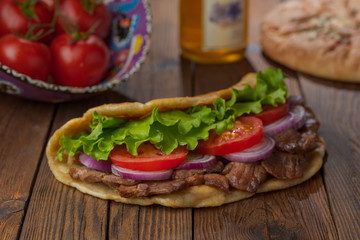 background,barbecue,beef,bread,cabbage,chicken,closeup,dinner,donner,döner,fast,food,greek,green,grilled,gyro,hamburger,health,healthy food,kebab,kebap,lettuce,lunch,meal,meat,onion,orange,pita,roast,