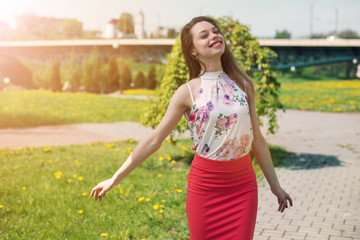 lifestyle concept - beautiful happy woman enjoying summer outdoors