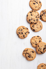 American cookies with chocolate chips on white wooden background. Top view.