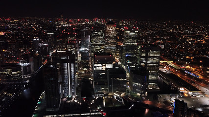 Aerial bird's eye view photo taken by drone of famous Canary Wharf skyscraper complex, Isle of...