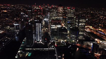 Aerial bird's eye view photo taken by drone of famous Canary Wharf skyscraper complex, Isle of...