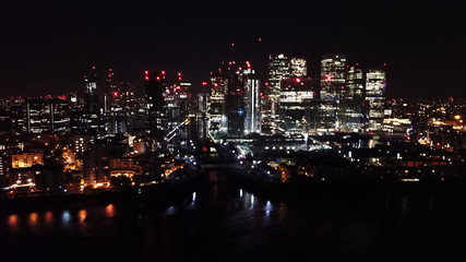 Aerial bird's eye view photo taken by drone of famous Canary Wharf skyscraper complex, Isle of...