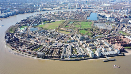 Aerial bird's eye view photo taken by drone of Greenwich village residential area by river Thames,...