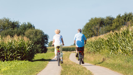 Full length of a senior active couple smiling and looking forward with confidence and serenity...
