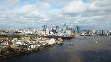 Naklejka premium Aerial bird's eye view photo taken by drone of famous Docklands and Canary Wharf skyscraper complex, Isle of Dogs, London, United Kingdom