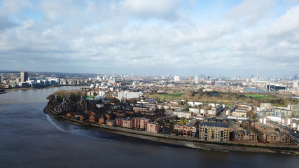 Obraz premium Aerial bird's eye view photo taken by drone of Greenwich village residential area by river Thames, London, United Kingdom