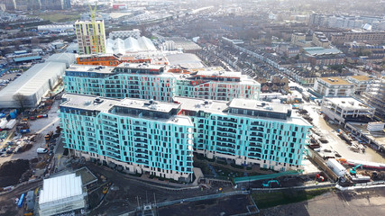 Fototapeta premium Aerial bird's eye view photo taken by drone of Greenwich village residential area by river Thames, London, United Kingdom