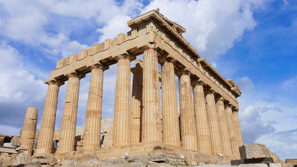 Beautiful scattered clouds on blue sky and iconic Parthenon temple at spring, Acropolis hill, Athens historic center, Attica, Greece