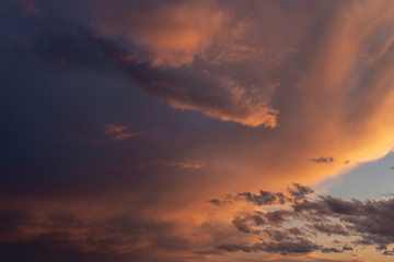 Beautiful sky with orange clouds - nature background.