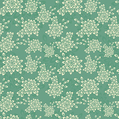 Floral green background in vintage style. Seamless pattern with flowers.