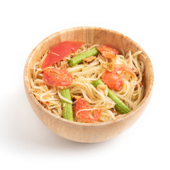 Papaya salad in a wooden bowl on a white background