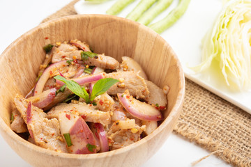 Hot and Spicy Grilled Pork Salad on a white background, Nam Tok Moo